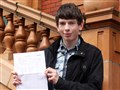 Karl Fairhurst with his 4 A* Grades