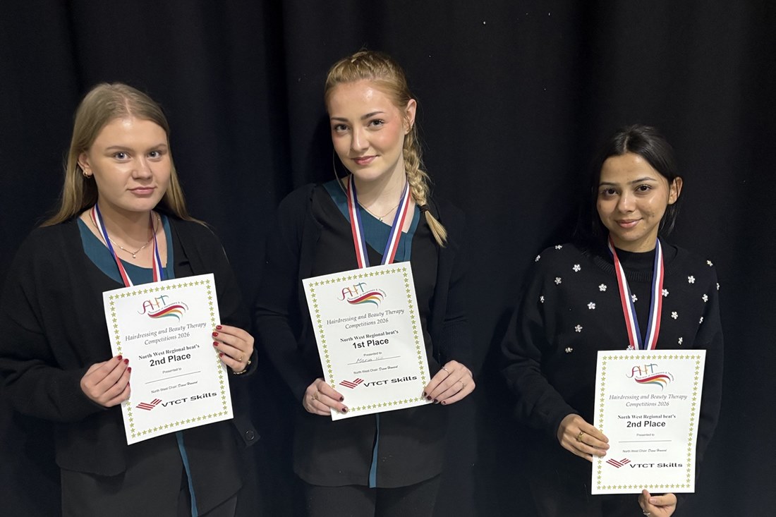 Students with their certificates and medals