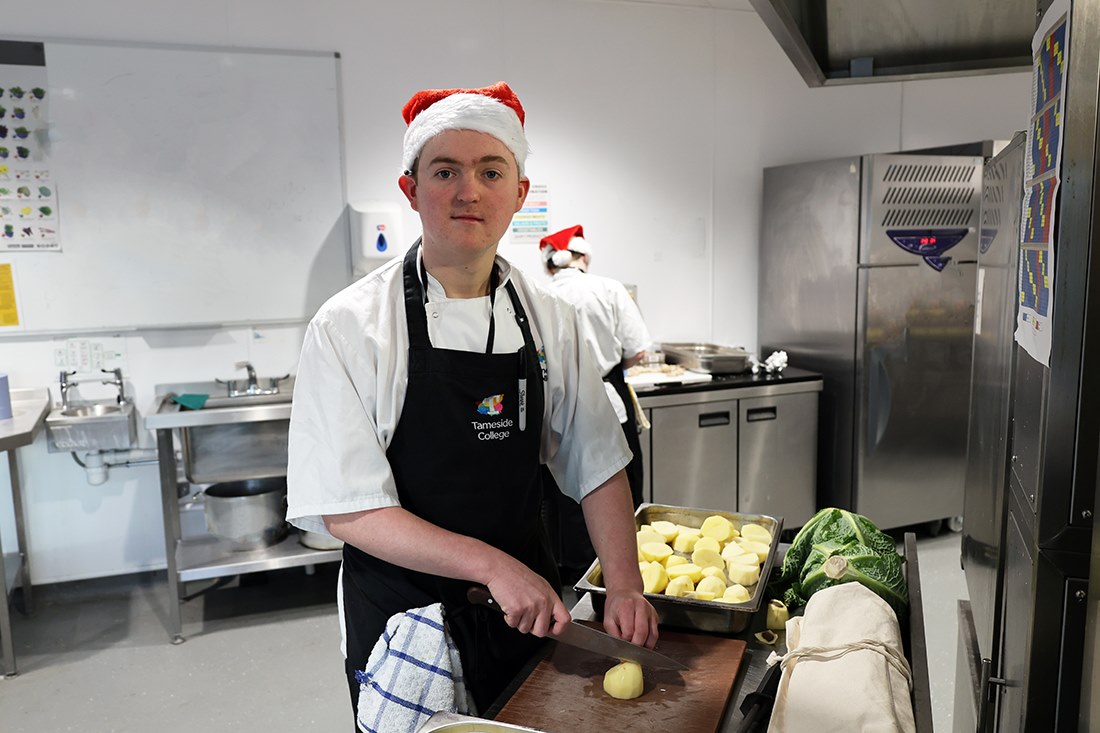 Alex during his studies prepping Christmas lunch
