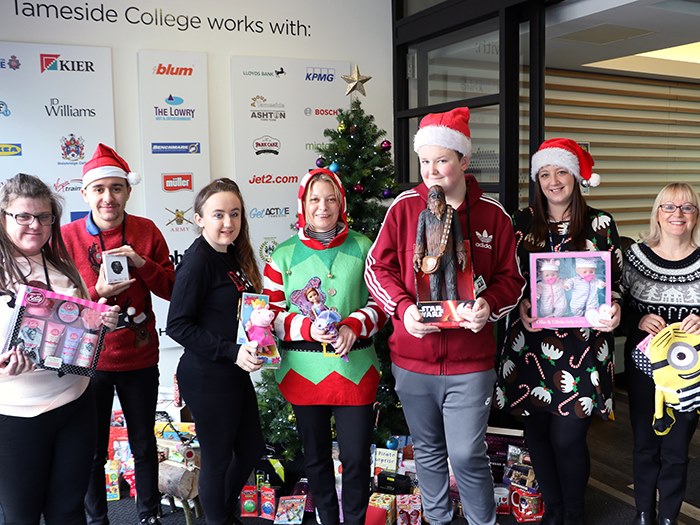Staff and students with donated gifts