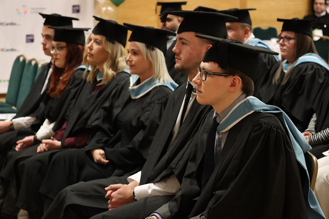Students listening to the speeches