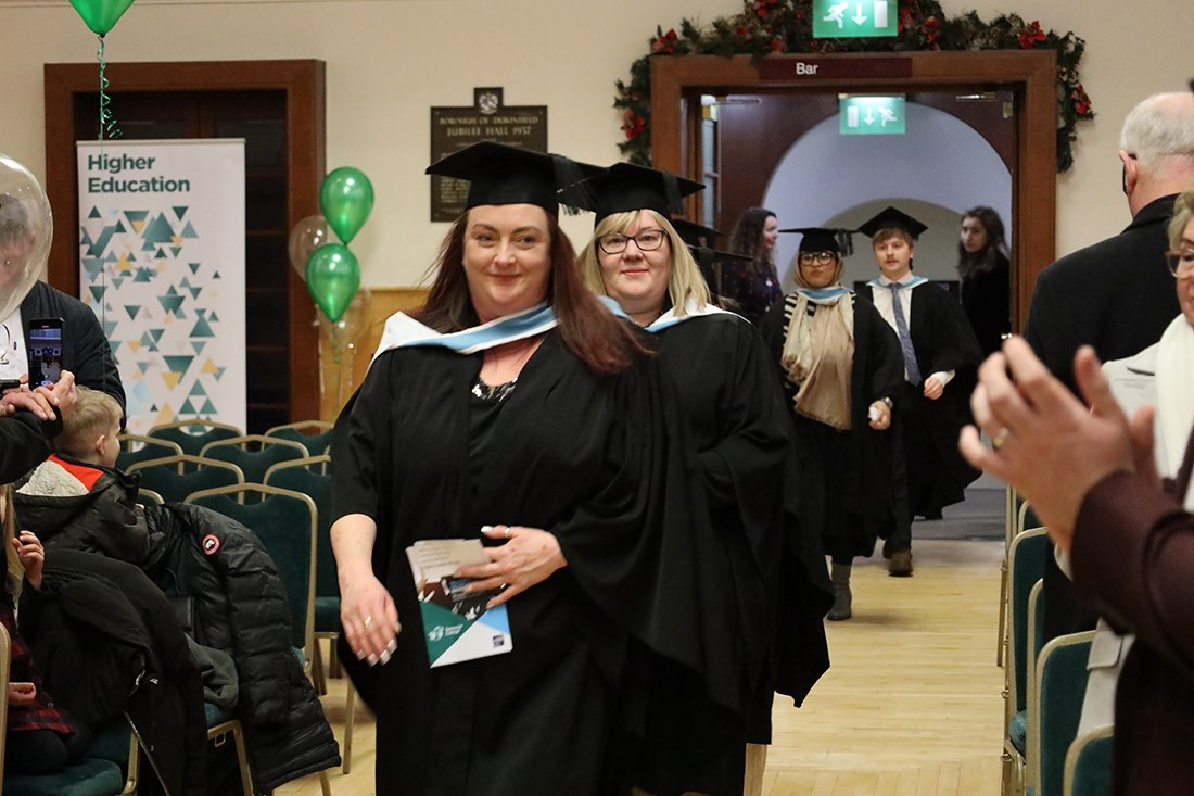 Graduates parading into the ceremony