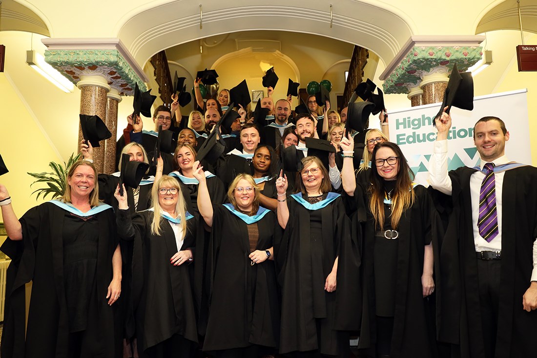 Graduates celebrate after the ceremony