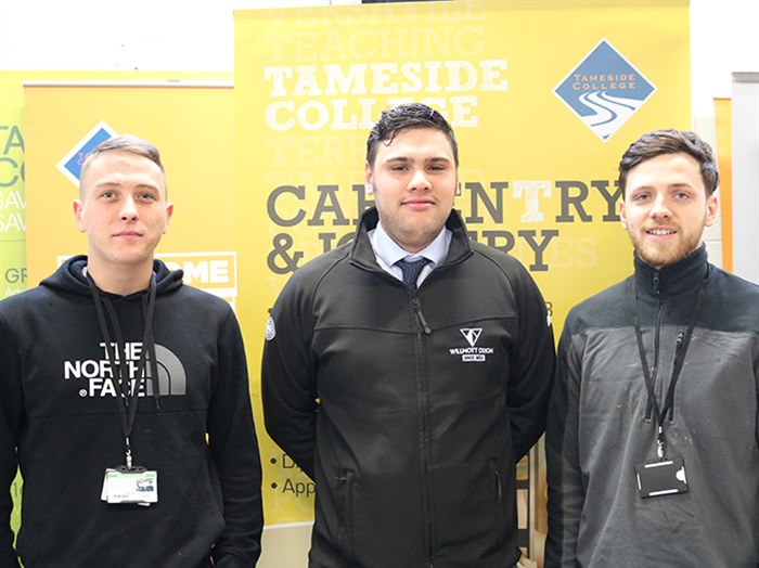 Harrison with Tameside College students