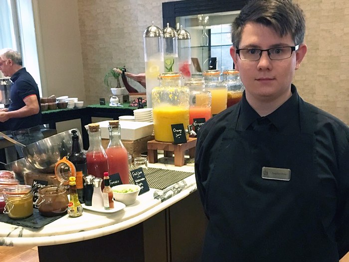 Stephen working in the breakfast bar