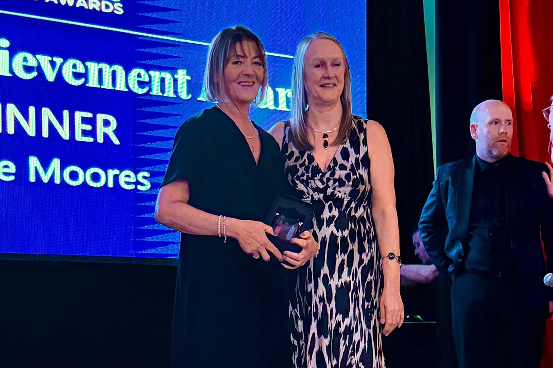 Jackie being presented with her award