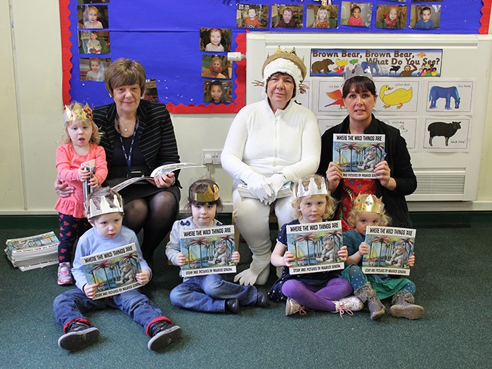 Jenny Worsdale reads to nursery children.