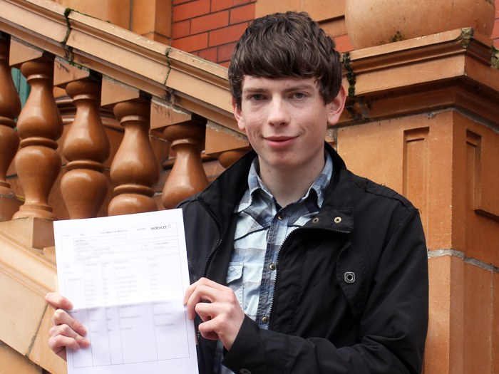 Karl Fairhurst with his 4 A* Grades