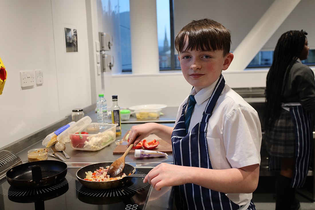 Tyler preparing his dish