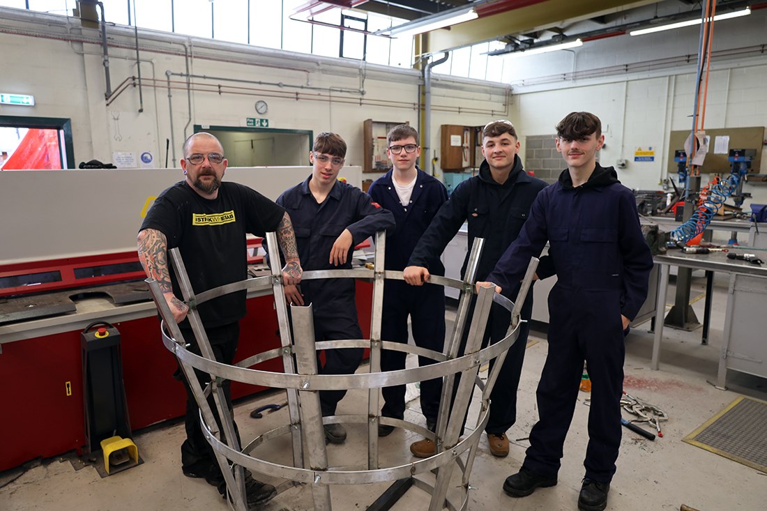 Engineering students working on the beacon