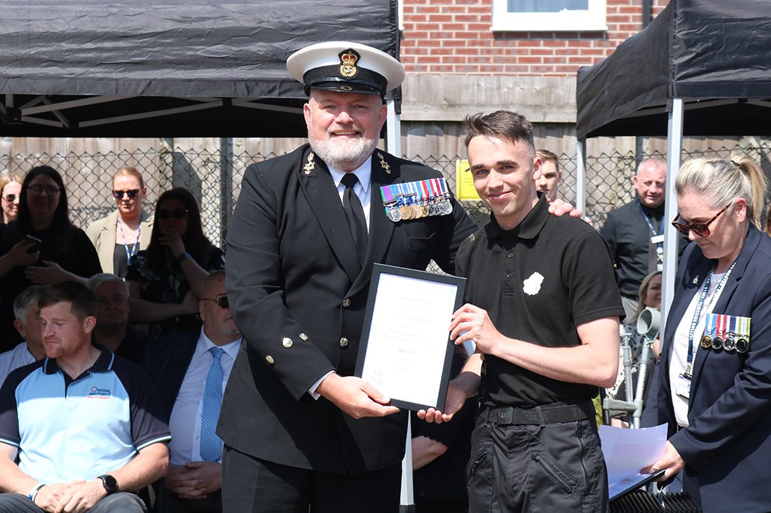 Chief petty officer Garner presenting awards