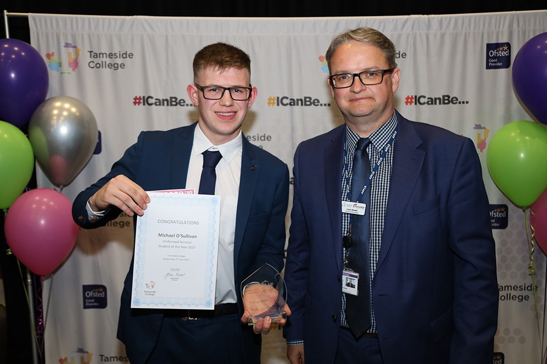 Michael receiving his overall student of the year award