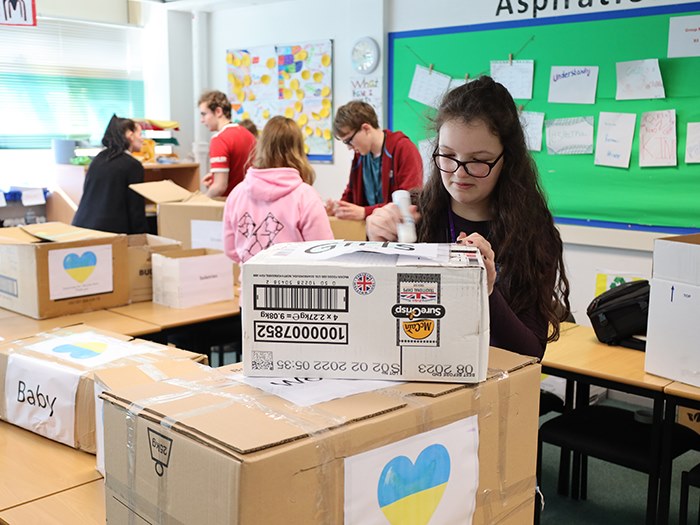 Students packed the boxes by gender and age