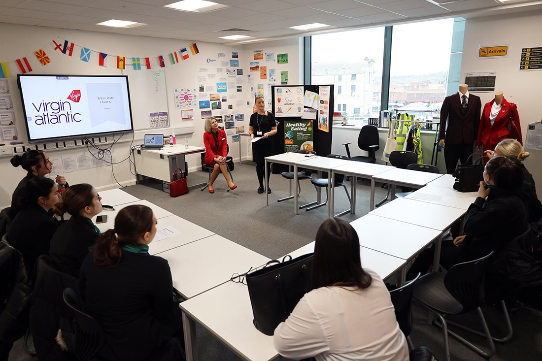 Laura chatting to students  about her career