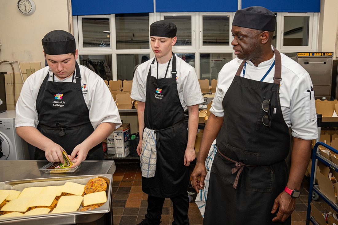 Students working in the kitchens for the event